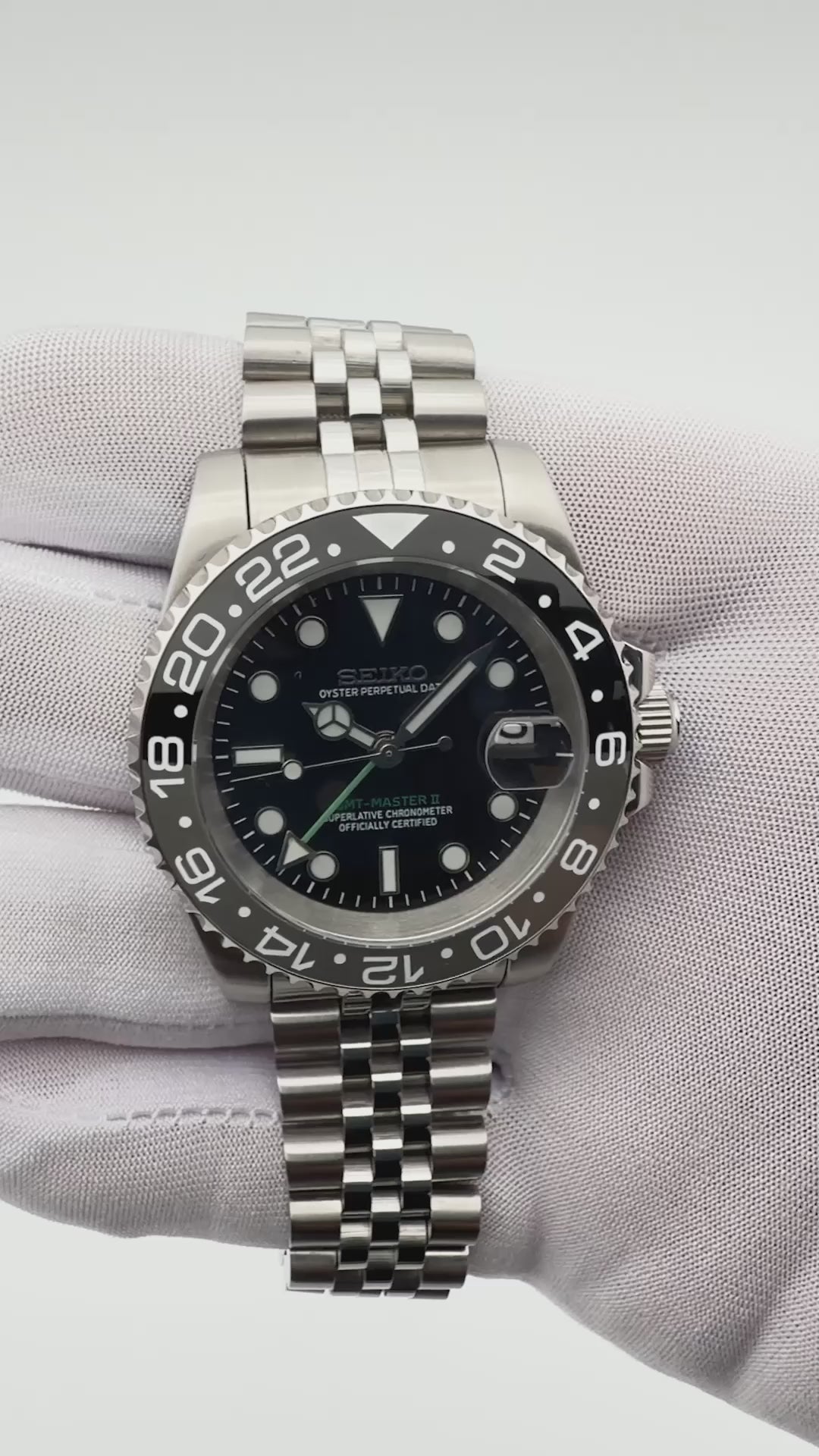Seiko Bruce Wayne GMT automatic mod watch with black and gray bezel and jubilee bracelet video showcase