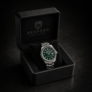 A Bexford wristwatch with a silver-tone metal bracelet and green dial, displayed inside an open black presentation box on a dark background.